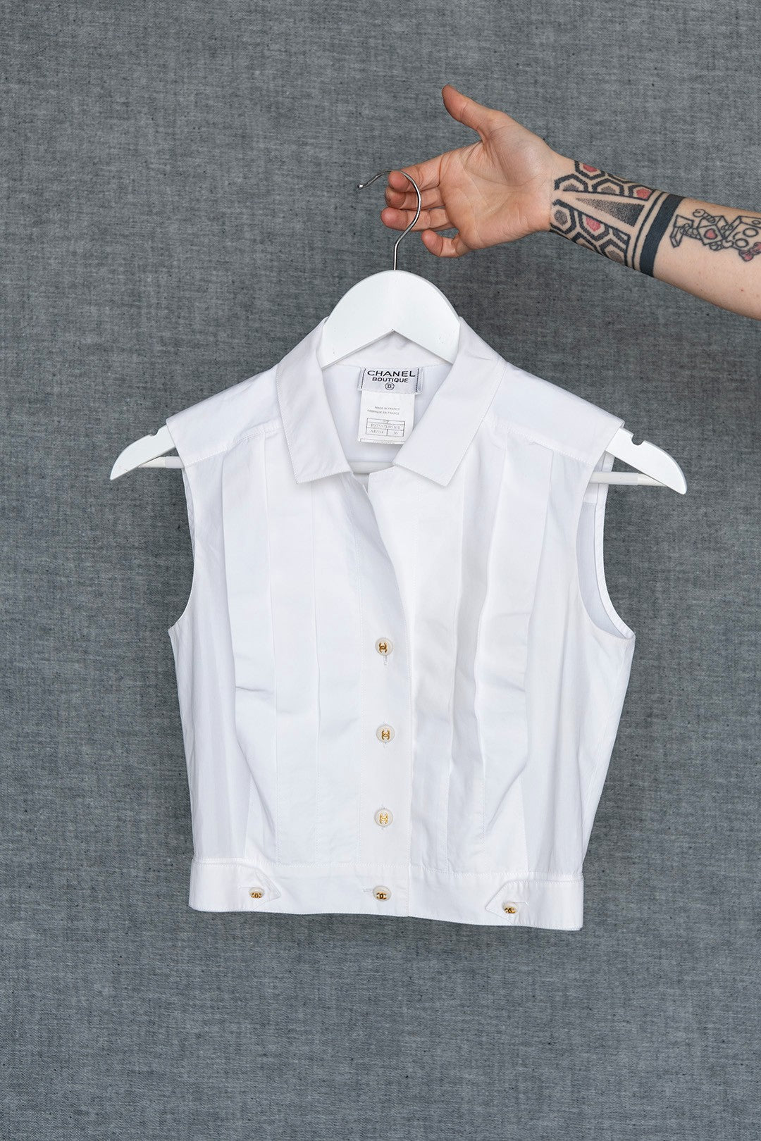 TOP SMANICATO BIANCO