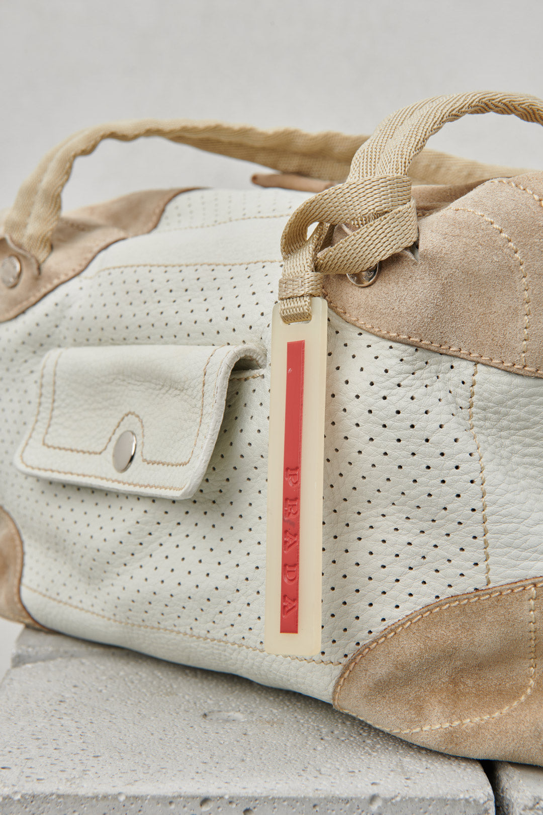 PERFORATED WHITE LEATHER AND SUEDE BAG