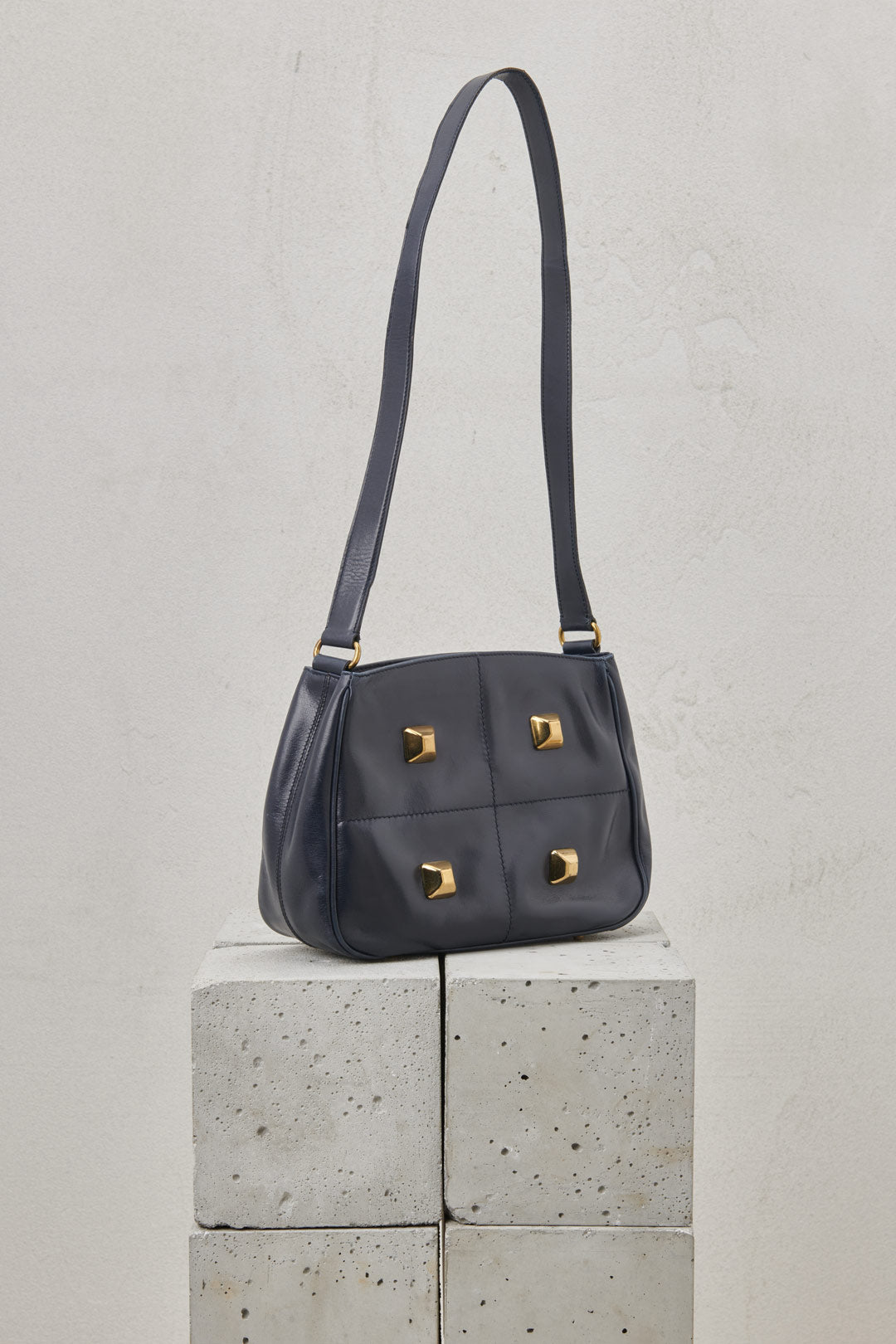 BLUE LEATHER BAG AND STUDS