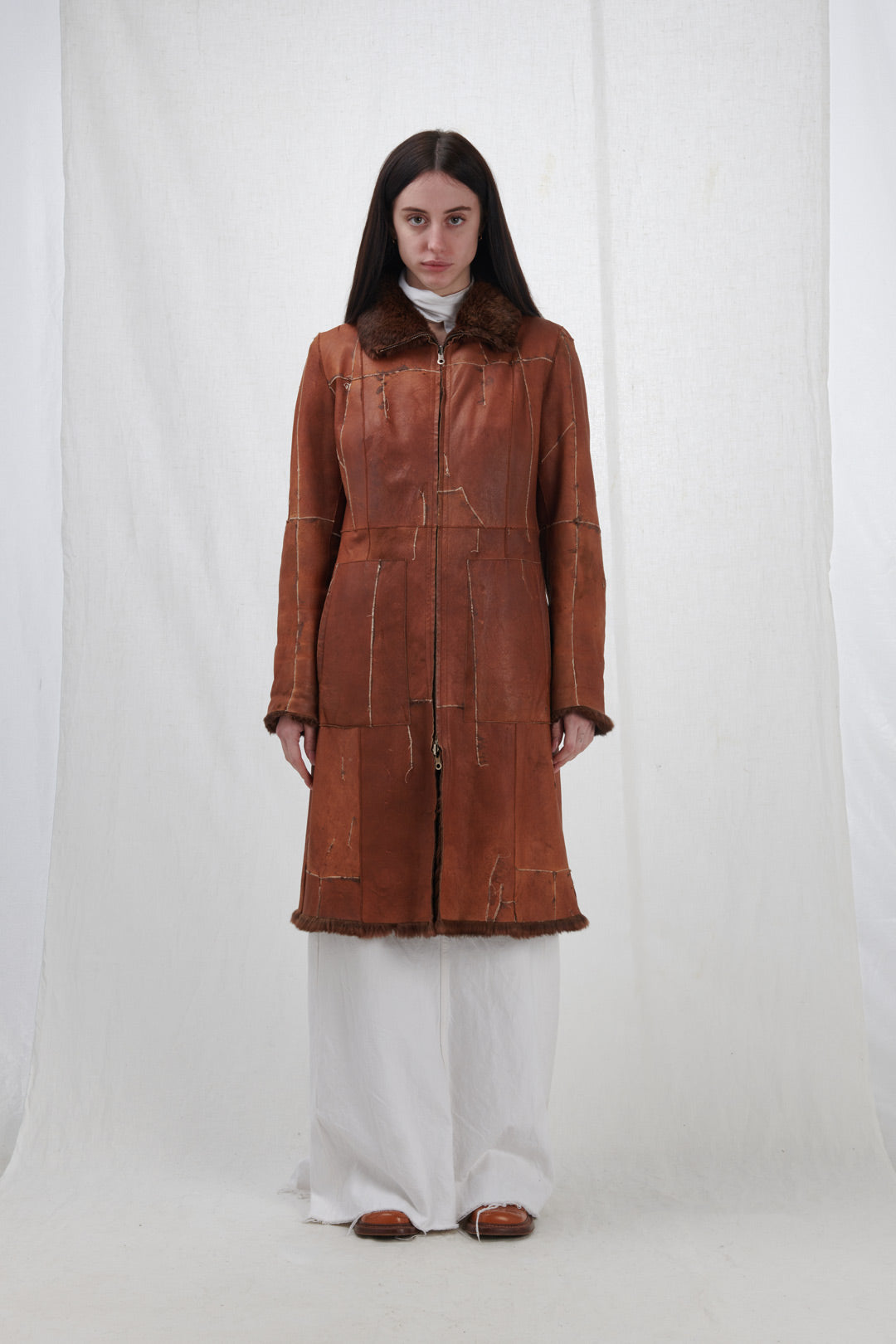 LEATHER COAT WITH STITCHING