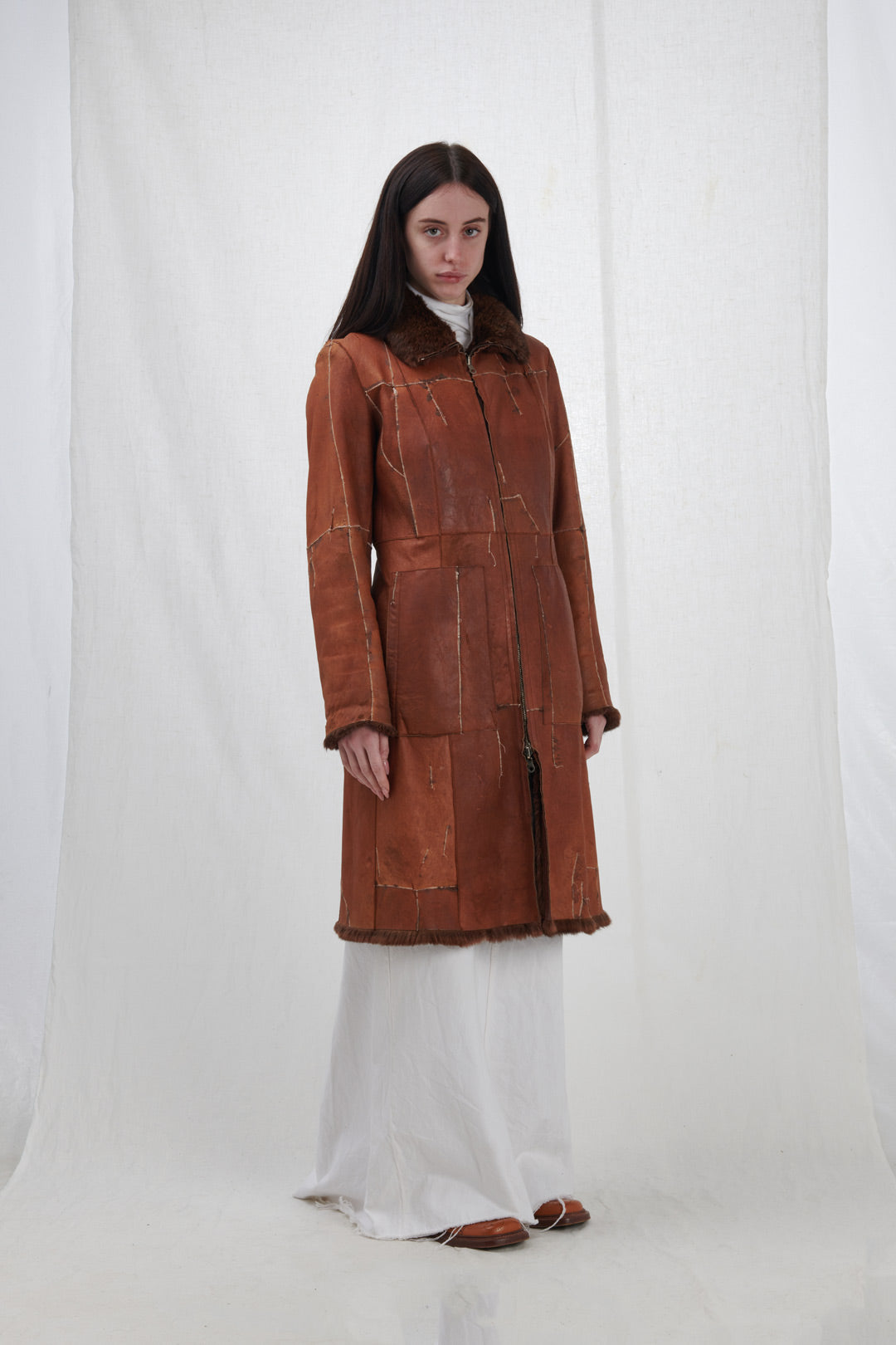 LEATHER COAT WITH STITCHING