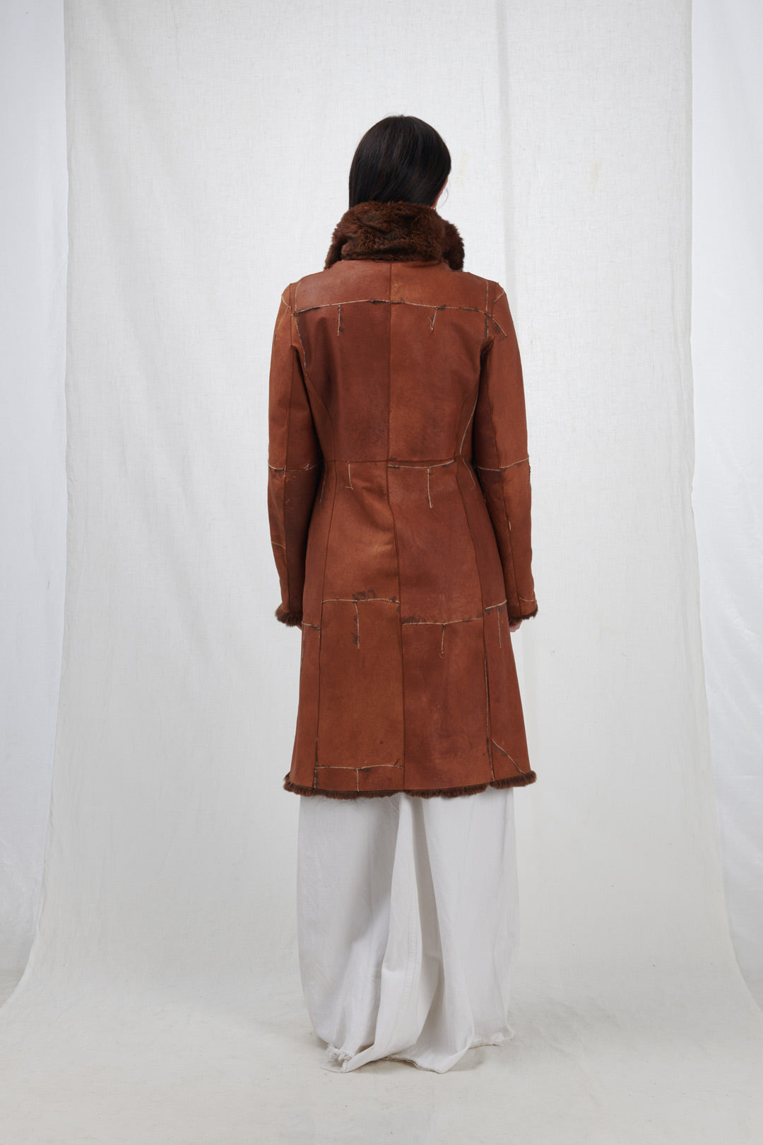 LEATHER COAT WITH STITCHING