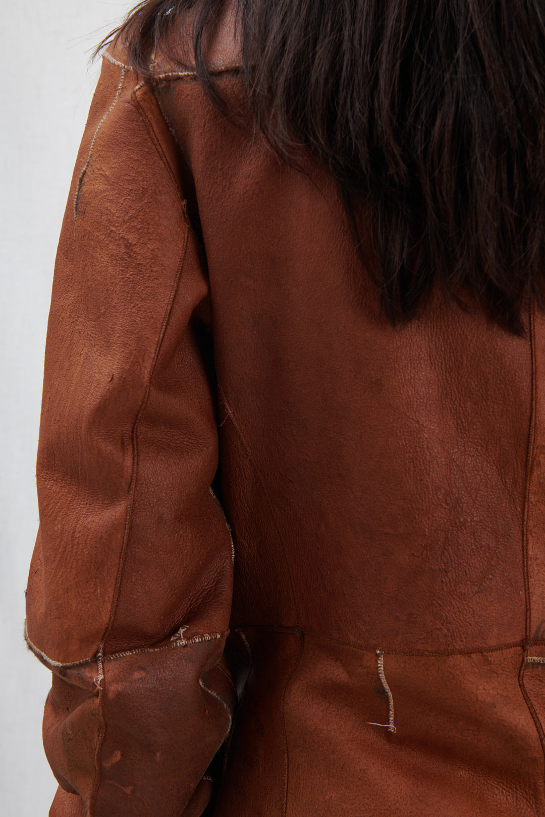 LEATHER COAT WITH STITCHING