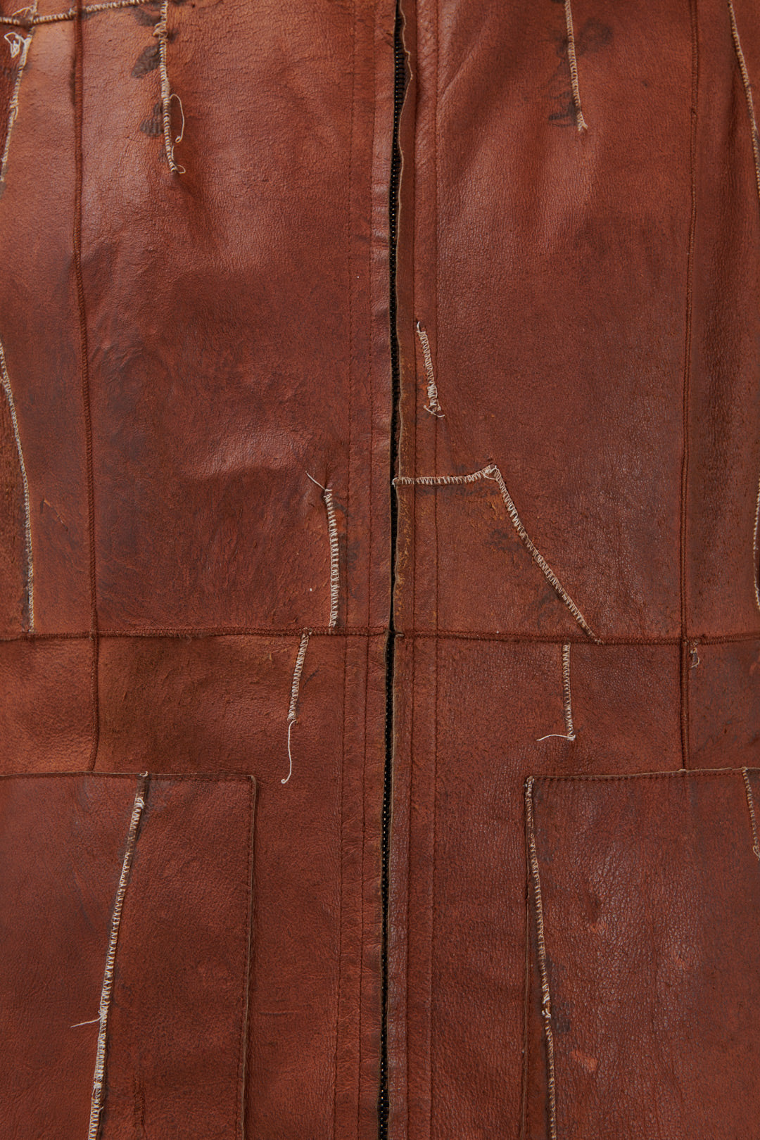 LEATHER COAT WITH STITCHING