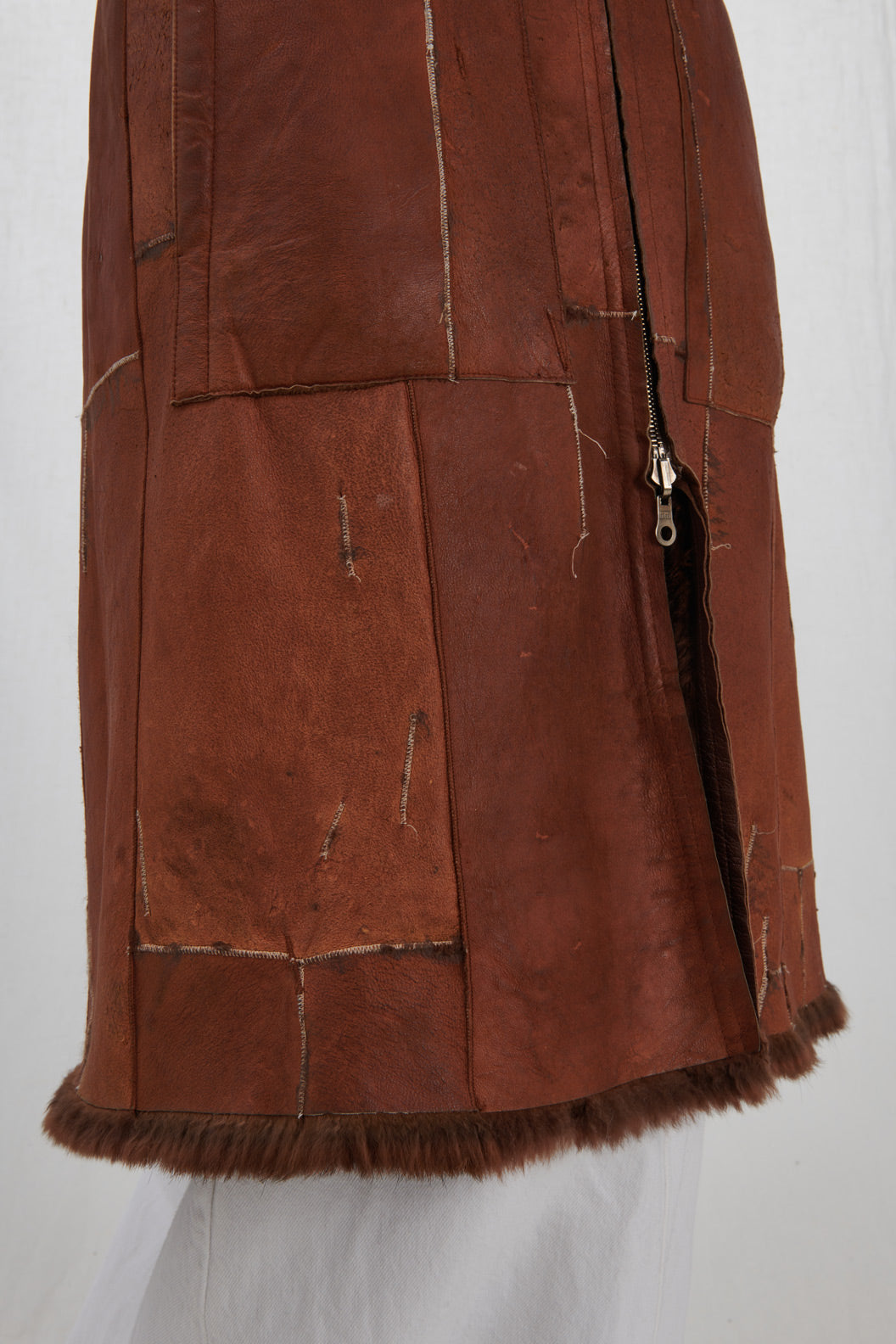 LEATHER COAT WITH STITCHING