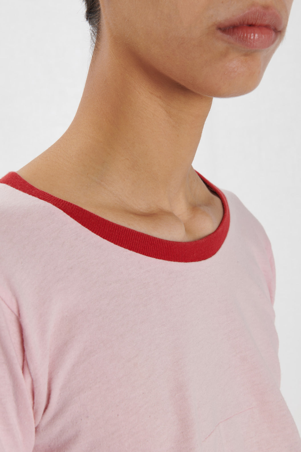 PINK T-SHIRT WITH RED PROFILES