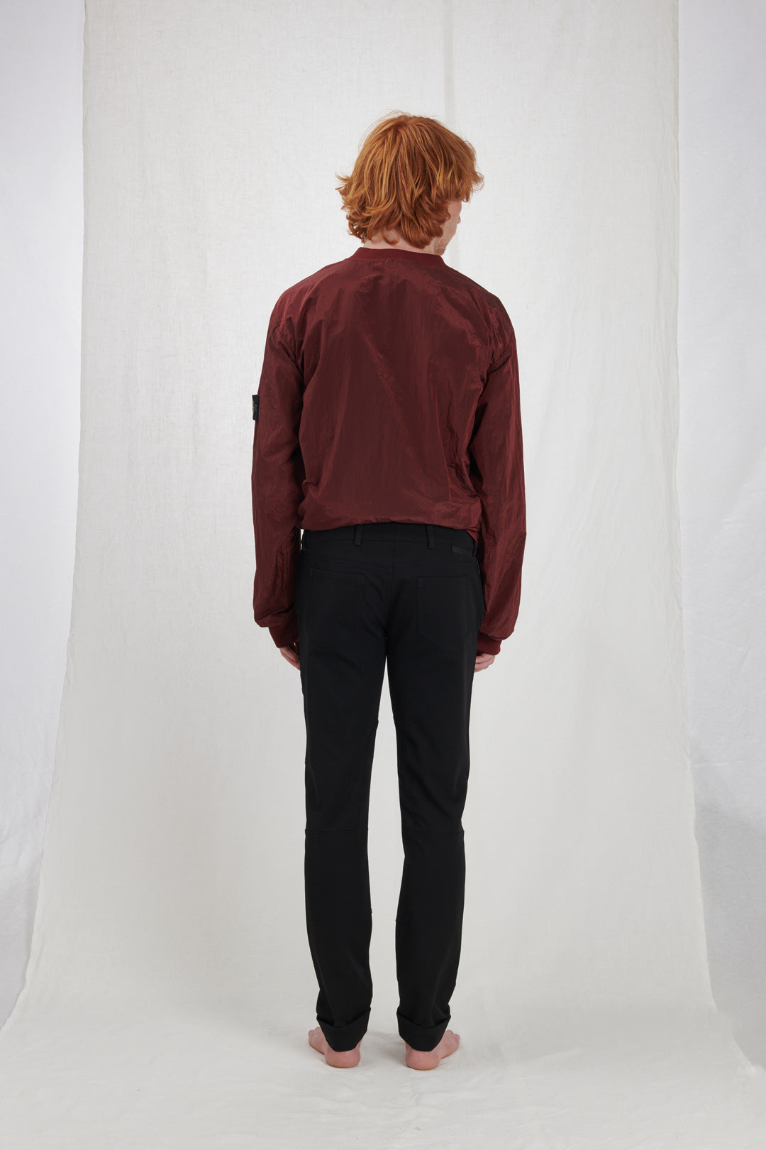 BLACK TROUSERS WITH CUT-UPS