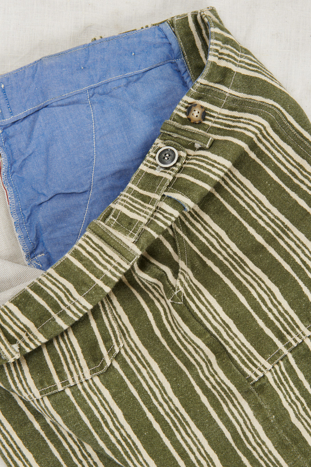 GREEN STRIPED BERMUDA SHORTS