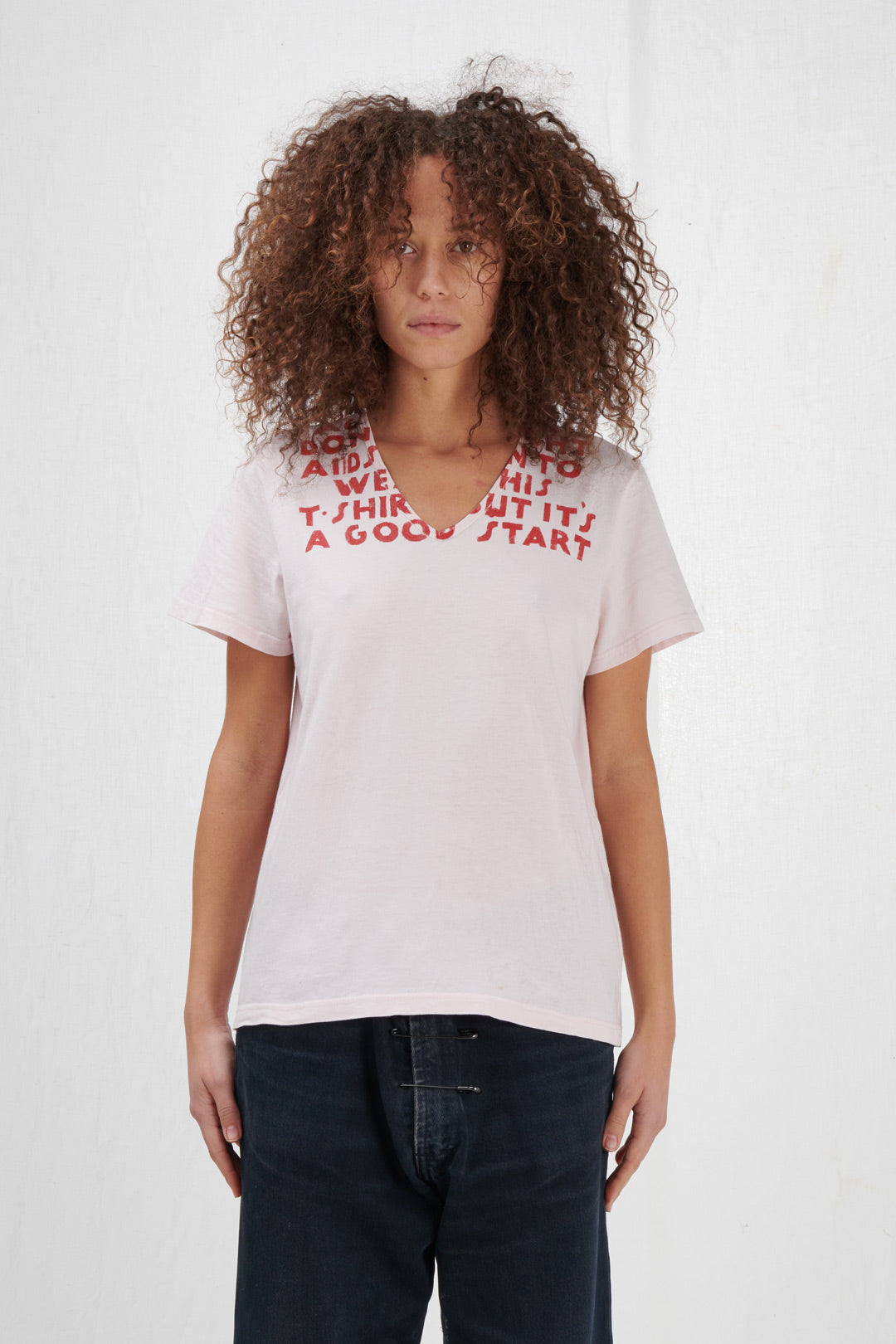 PINK AIDS T-SHIRT WITH RED WRITING