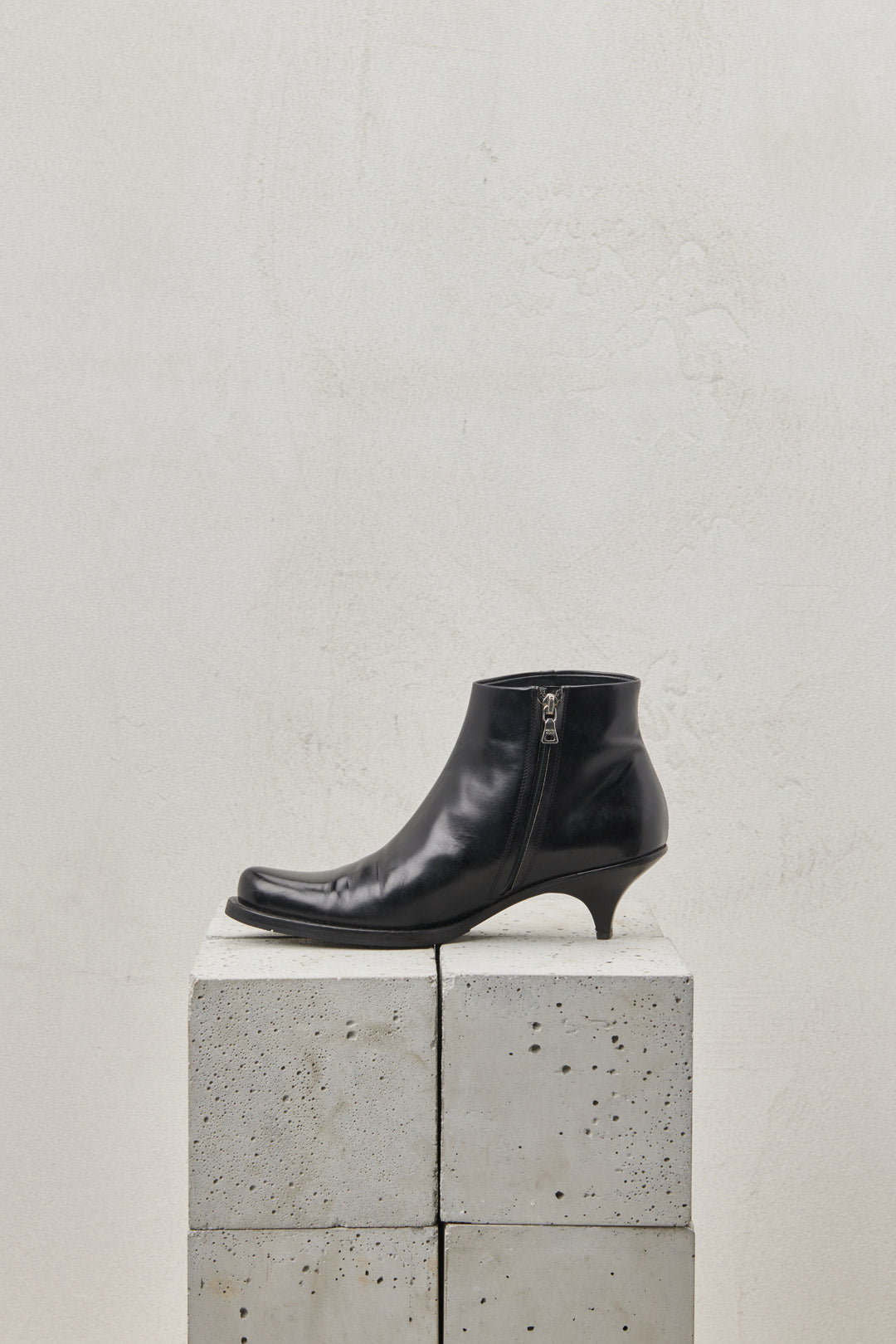 Pointed black ankle boot in brushed calf leather