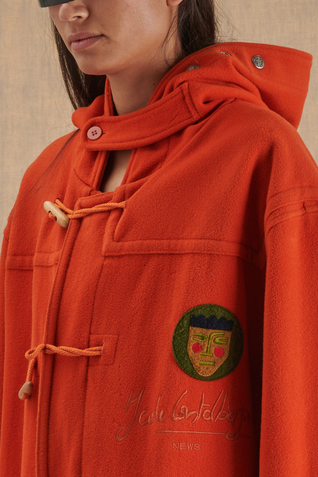 ORANGE MONTGOMERS WITH CONTRAST EMBROIDERY AND LINING