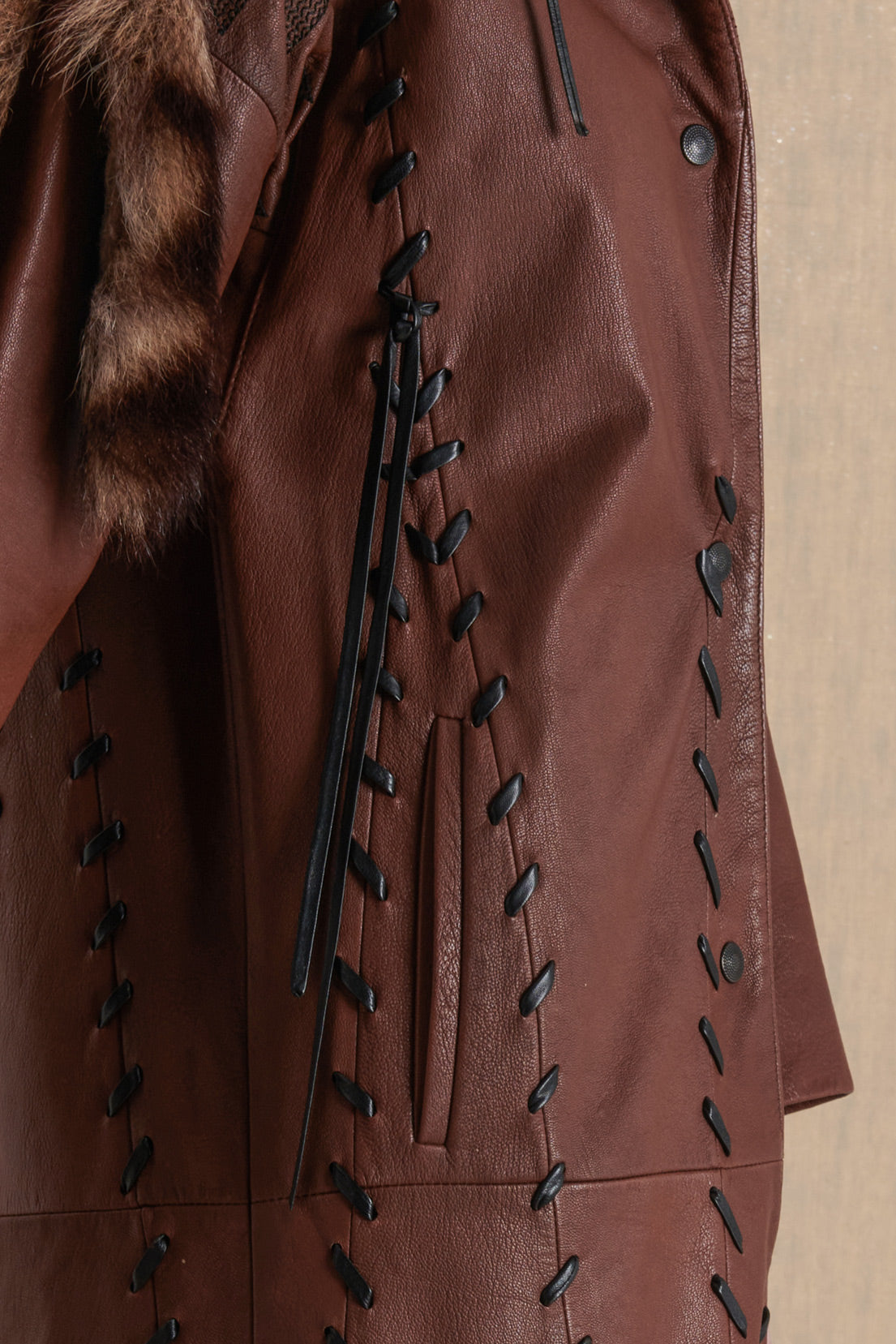 LEATHER COAT WITH FUR AND TRIANGULAR EMBROIDERY