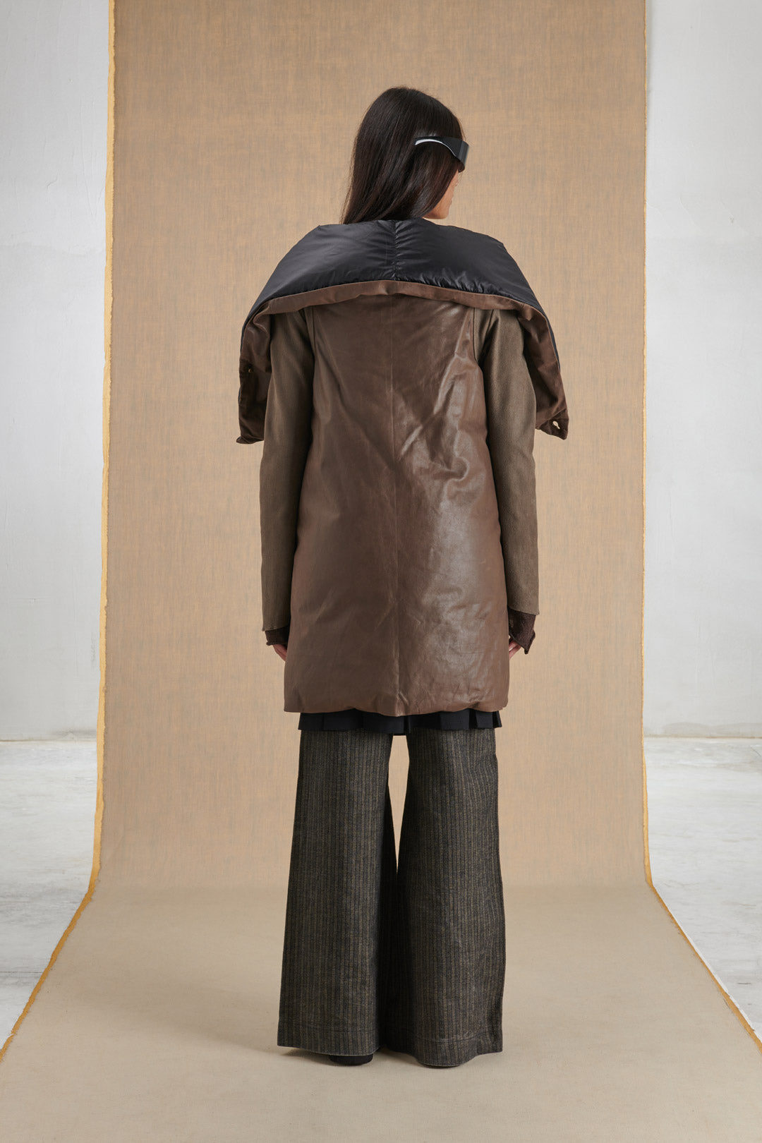 DOMED LEATHER COAT