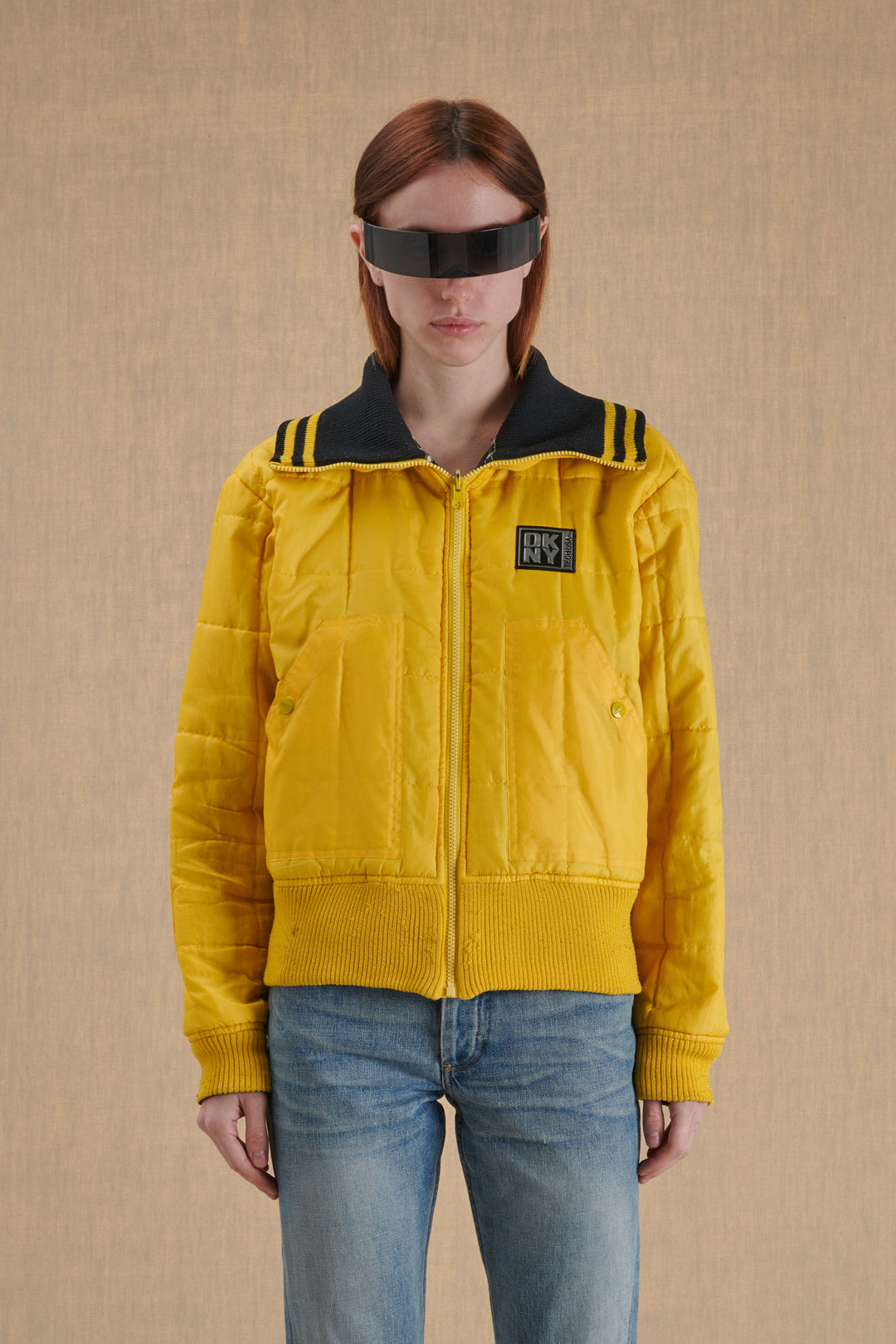 BLACK PUFFER JACKET WITH YELLOW DETAILS