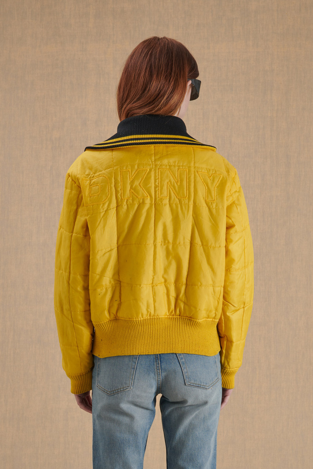 BLACK PUFFER JACKET WITH YELLOW DETAILS