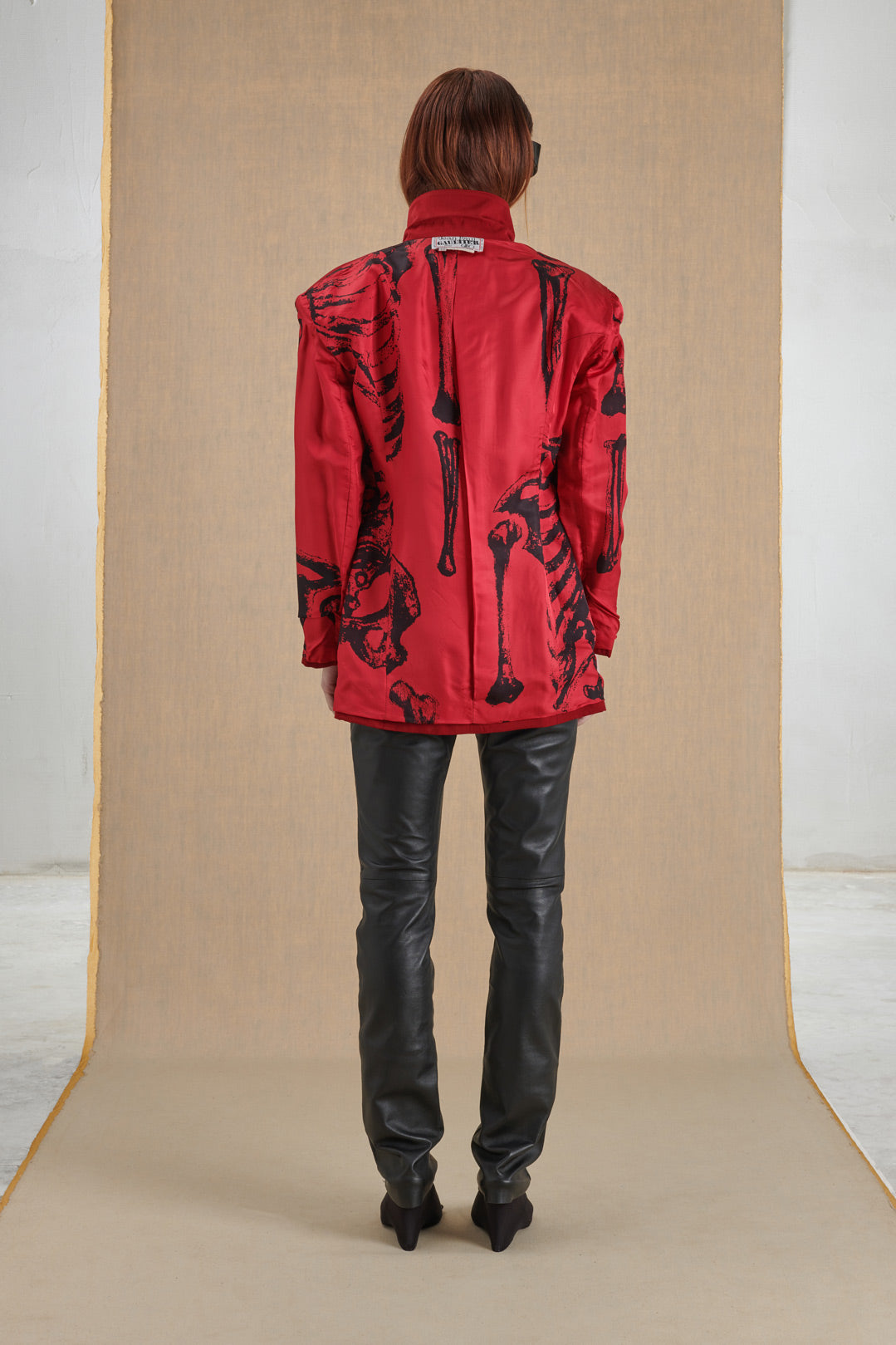 RED JACKET WITH PRINTED SKELETON LINING