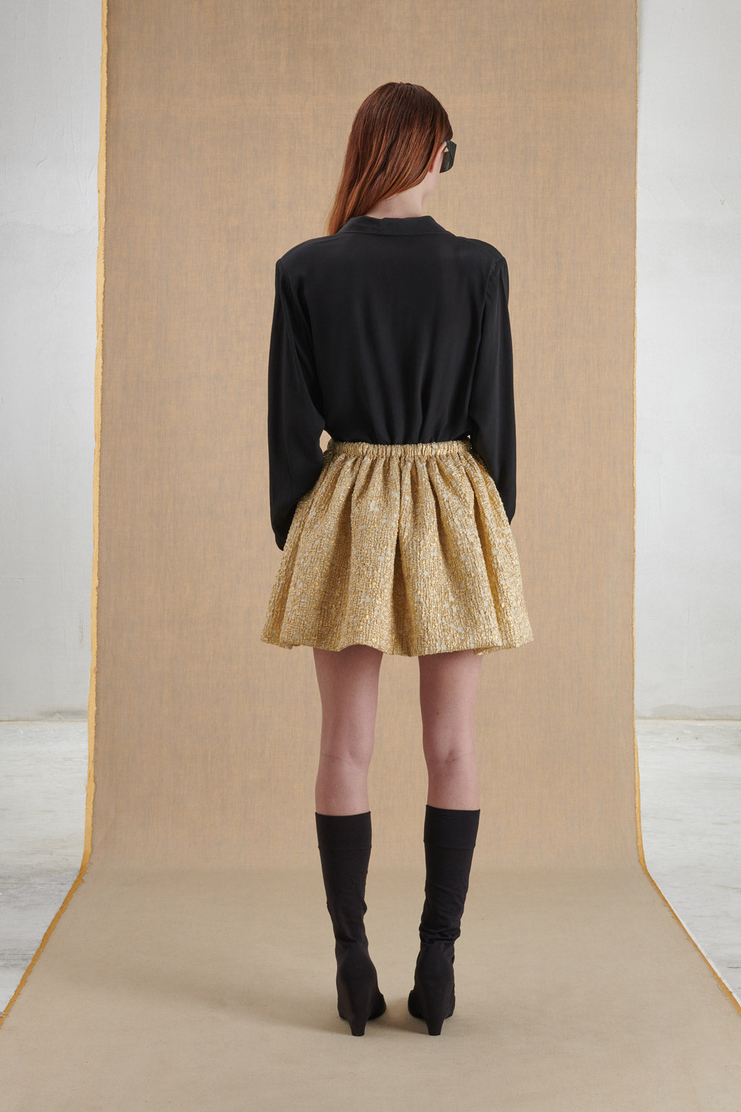 WHITE AND GOLD MINI SKIRT