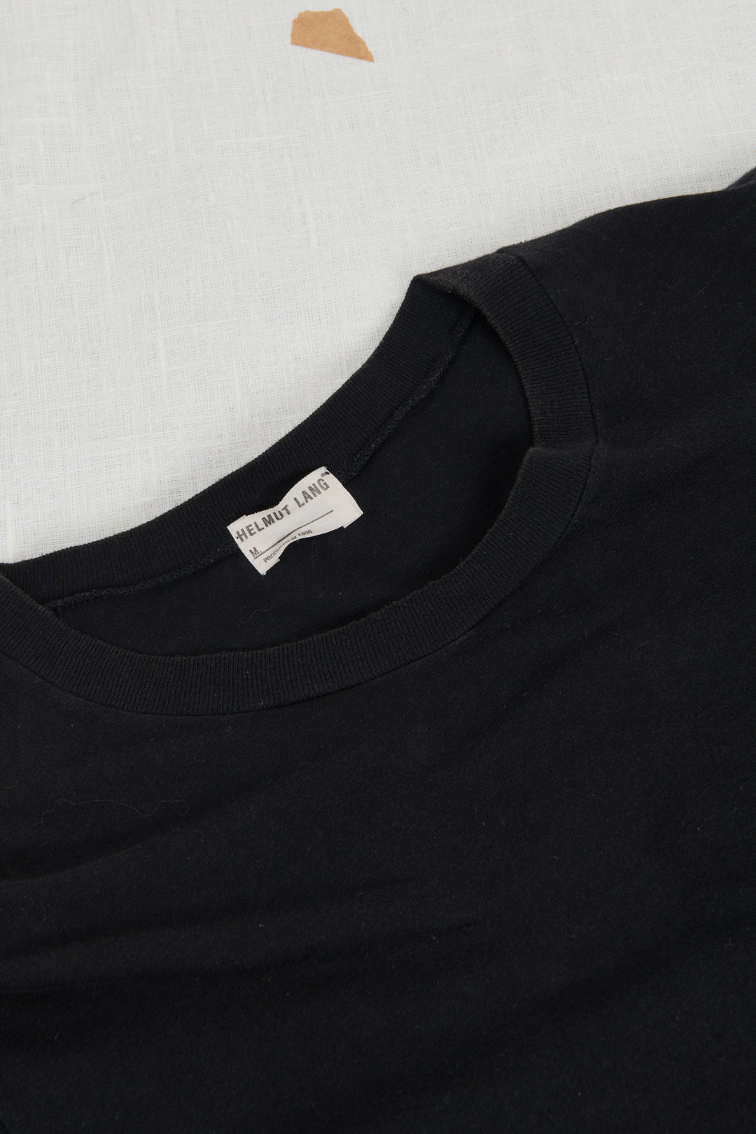 BLACK T-SHIRT WITH COATED GEOMETRIC PATTERN